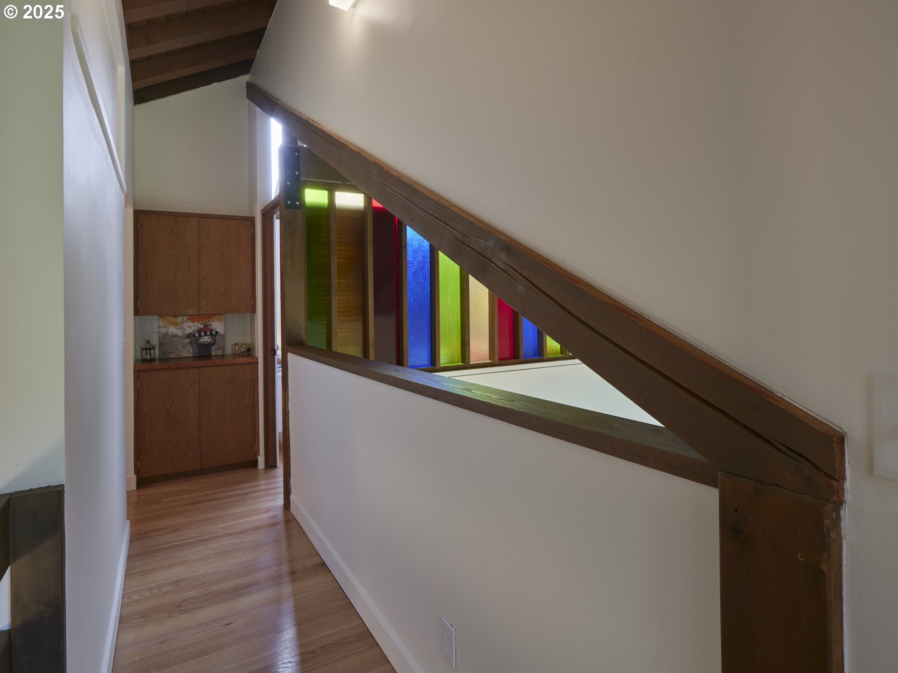 289 Classe Road Toledo, WA 98591 - Photo 23 of 48 a hallway with wooden floor and staircase