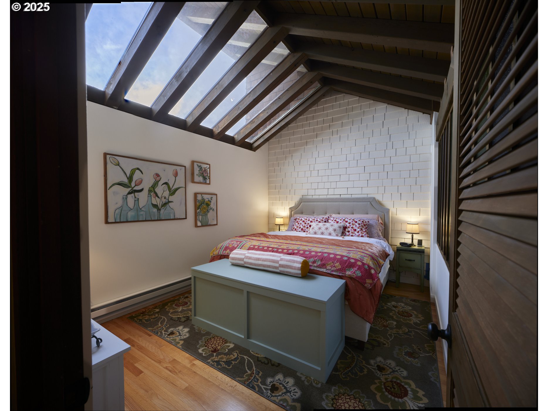 289 Classe Road Toledo, WA 98591 - Photo 25 of 48 a bedroom with a bed and a painting on the wall