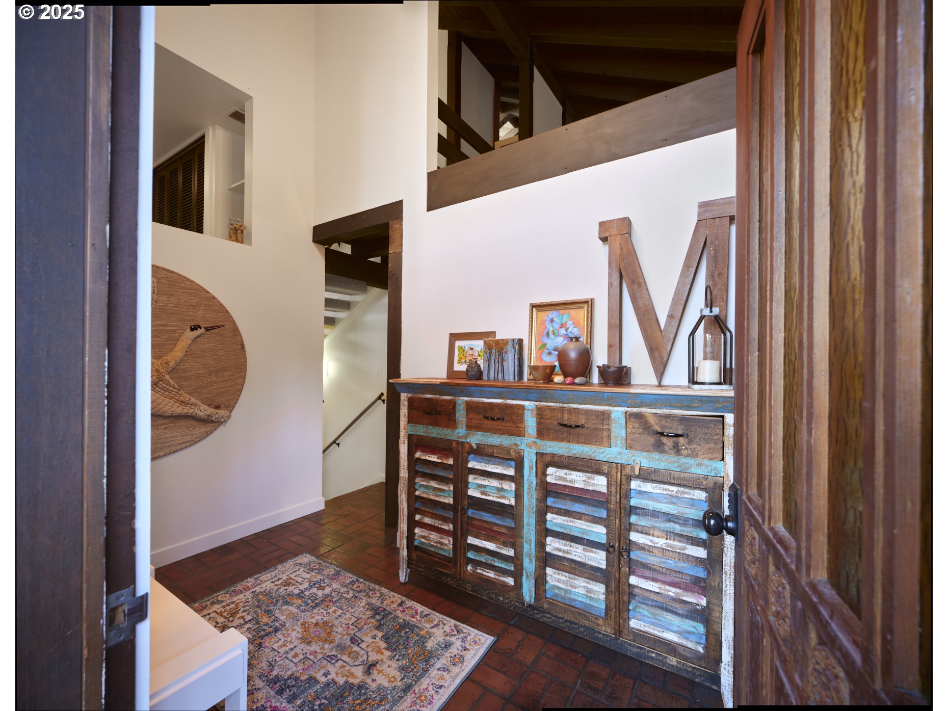 289 Classe Road Toledo, WA 98591 - Photo 3 of 48 a view of a hallway with wooden floor and entryway