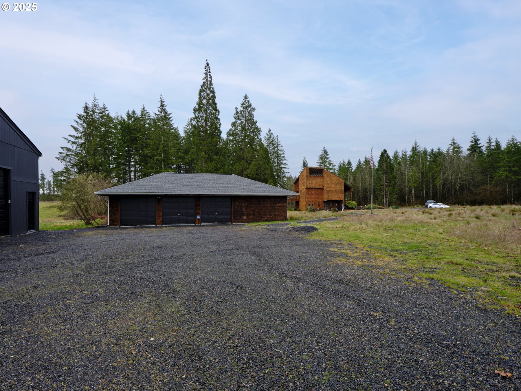 289 Classe Road Toledo, WA 98591 - Photo 41 of 48 a view of a large trees with barn in the background
