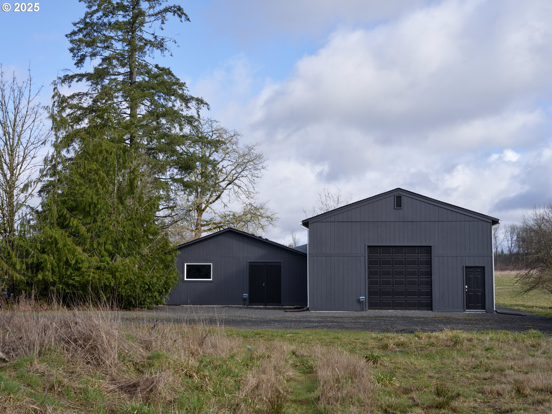 289 Classe Road Toledo, WA 98591 - Photo 43 of 48 a front view of a house with a yard and garage