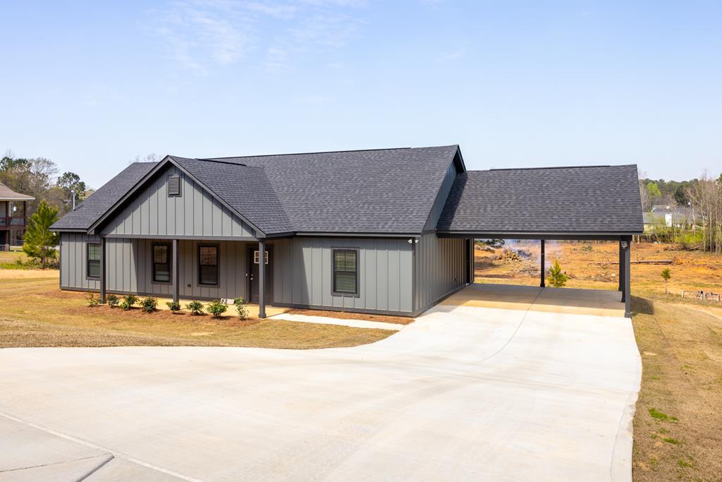 43 Lee Road Salem, AL 36874 - Photo 1 of 19 a house with palm trees in front of it