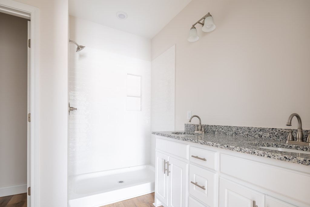 43 Lee Road Salem, AL 36874 - Photo 15 of 19 a bathroom with a granite countertop sink and a mirror