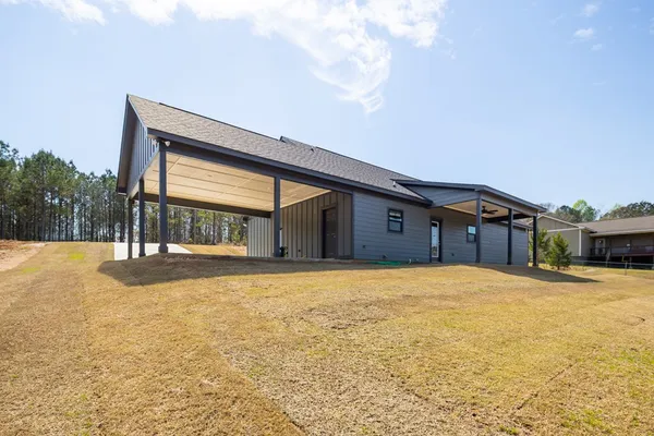 a house view with a outdoor space
