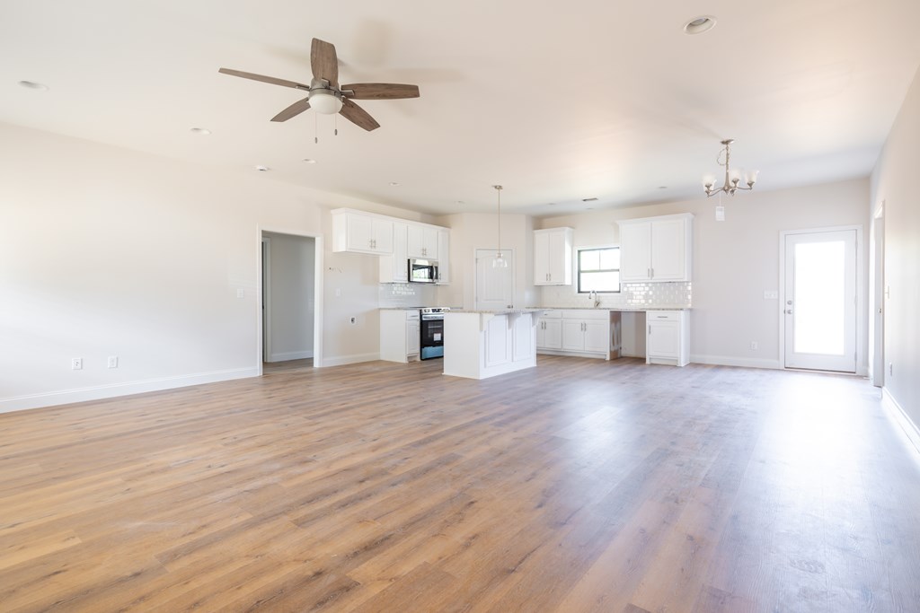 43 Lee Road Salem, AL 36874 - Photo 10 of 19 a view of a kitchen with a sink and a refrigerator