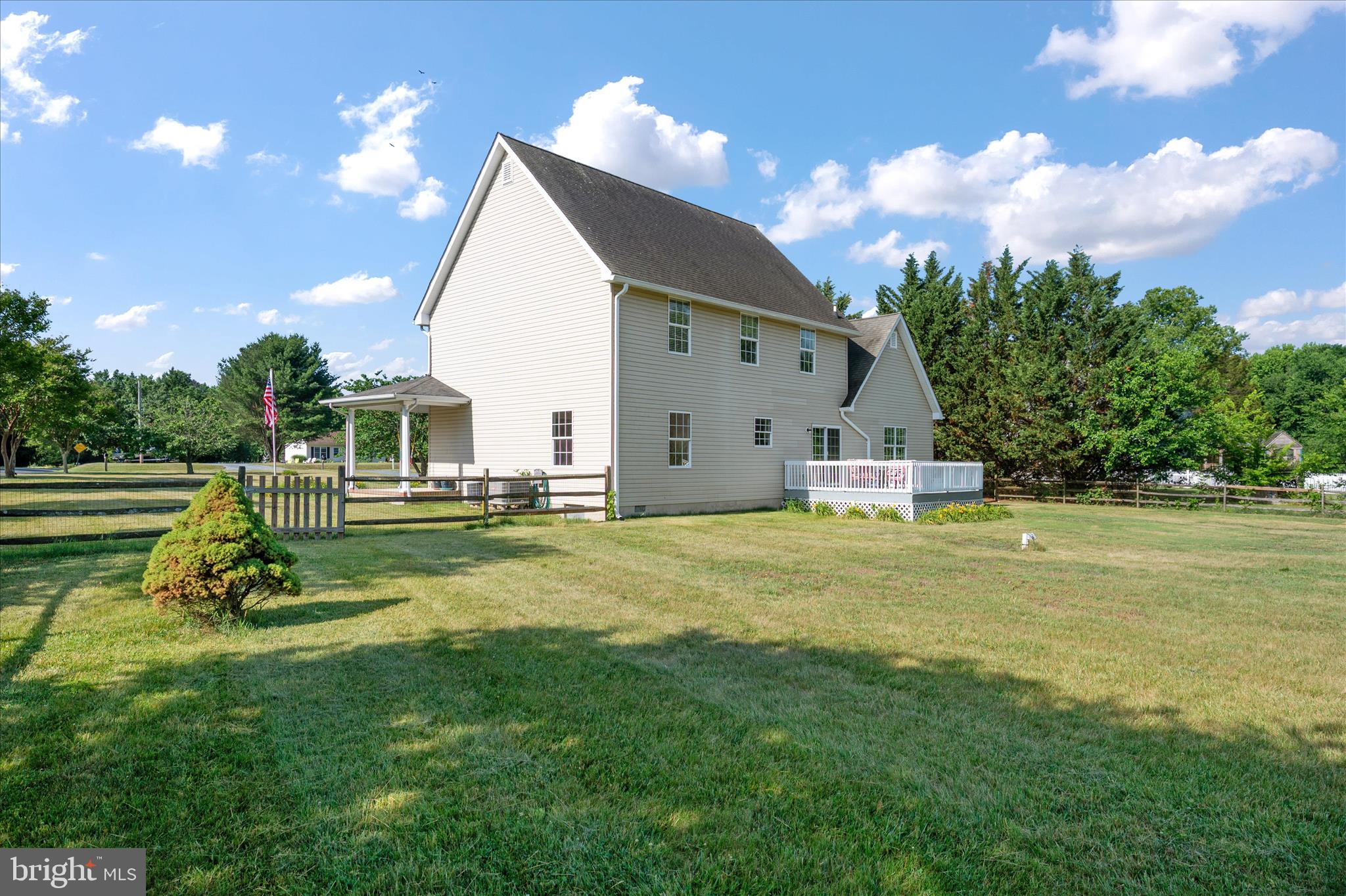 913 Clark Corner Road Centreville, MD 21617 - Photo 38 of 66 a view of a house with swimming pool and a yard