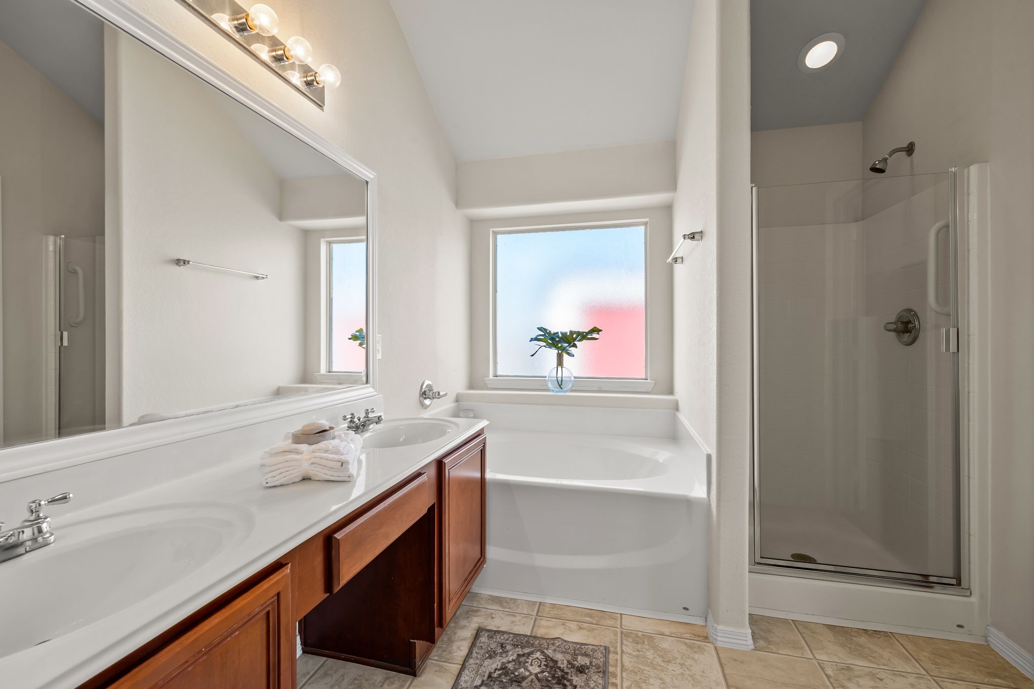 445 Decoster Boulevard Alvin, TX 77511 - Photo 16 of 32 Primary suite with tub and shower and double vanity