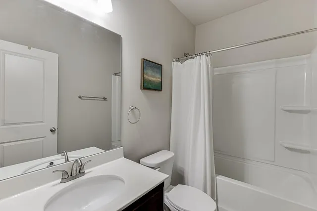 a view of an outdoor space with a table and chairs