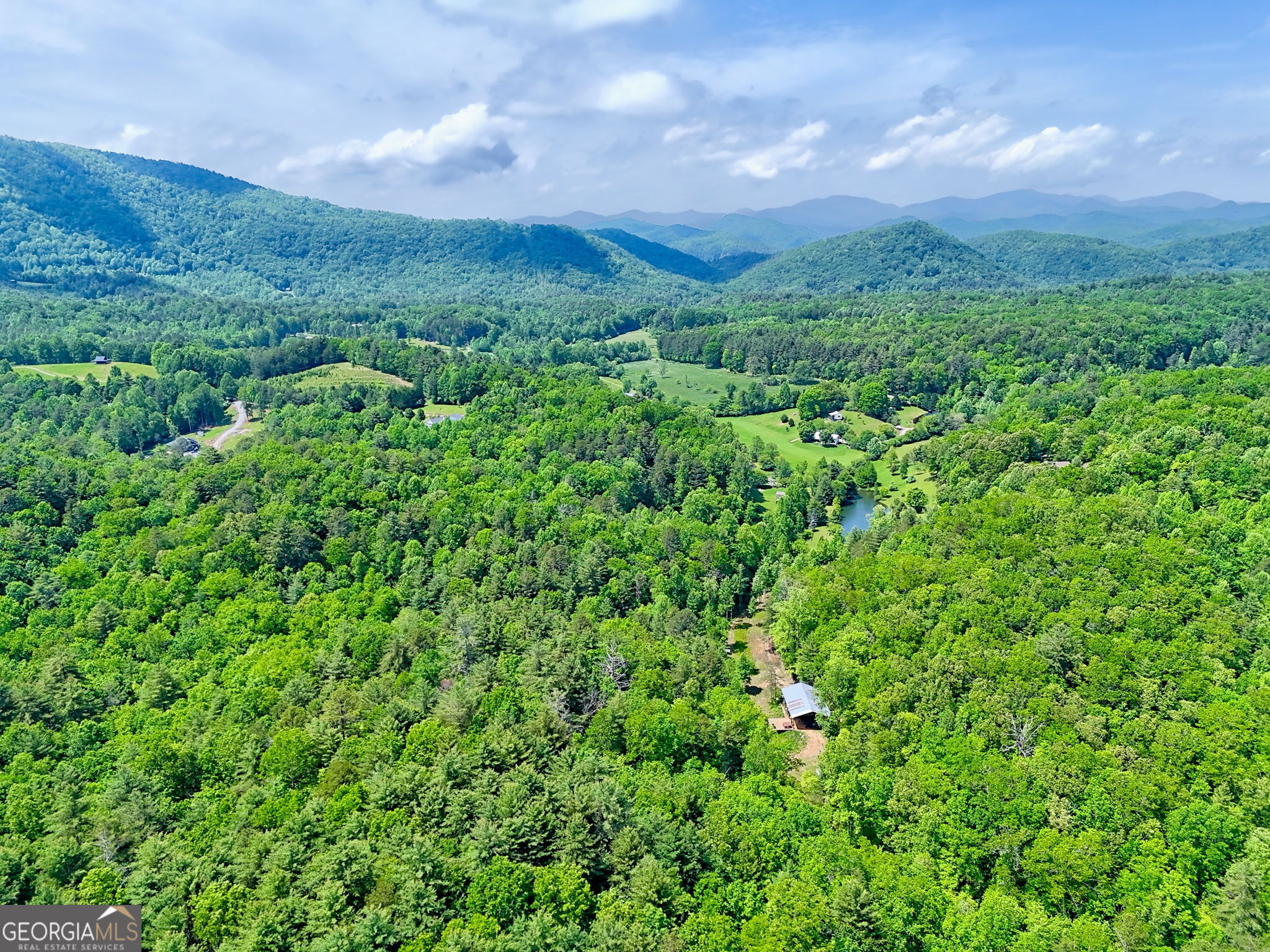 0 Peach Orchard Way Tiger, GA 30576 - Photo 11 of 27 a view of a city with lush green forest