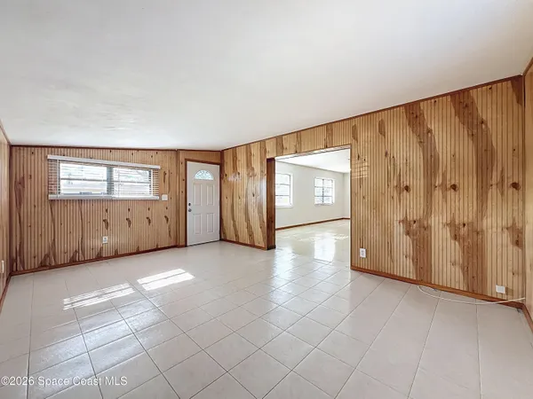an empty room with windows
