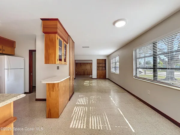 a view of a kitchen with a sink and dishwasher