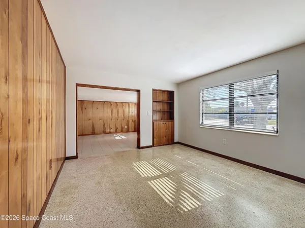 an empty room with windows