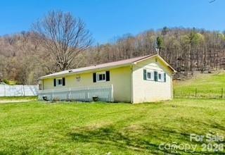 0 Odoms Chapel Road Bakersville, NC 28705 - Photo 2 of 31 a view of a house with a yard