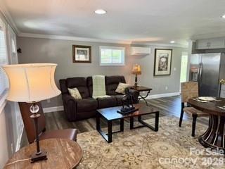 0 Odoms Chapel Road Bakersville, NC 28705 - Photo 5 of 31 a living room with furniture wooden floor and a flat screen tv