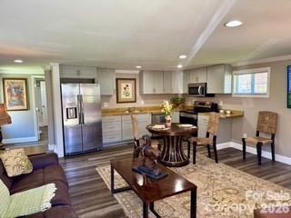 0 Odoms Chapel Road Bakersville, NC 28705 - Photo 6 of 31 a living room with stainless steel appliances furniture a dining table and kitchen view