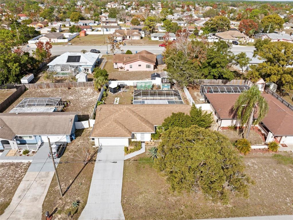 4307 Goldcoast Avenue Spring Hill, FL 34609 - Photo 3 of 53 an aerial view of a house with a yard