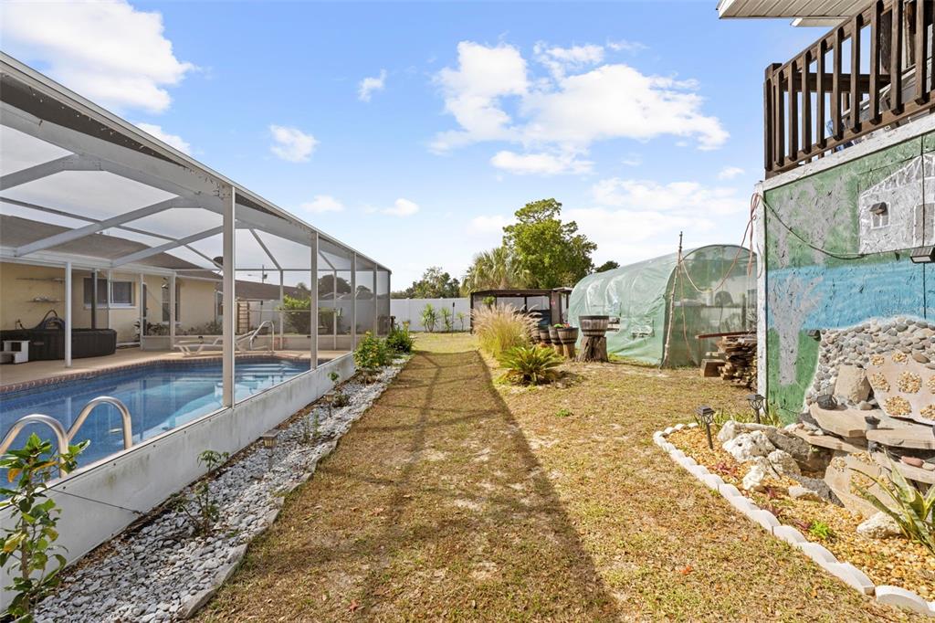 4307 Goldcoast Avenue Spring Hill, FL 34609 - Photo 47 of 53 a view of a house with swimming pool