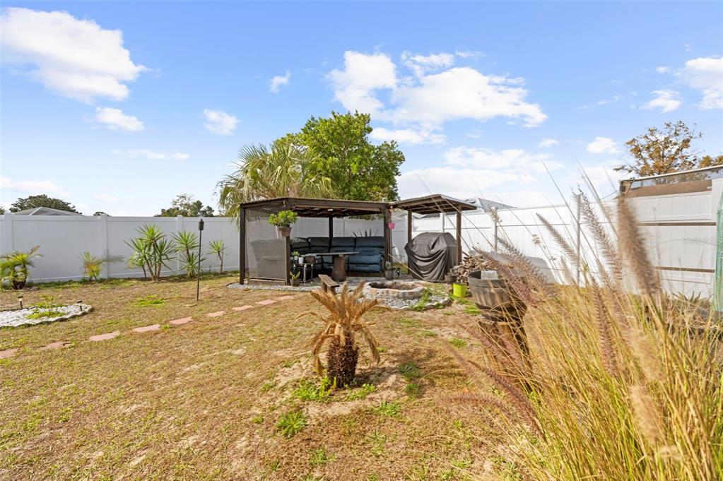 4307 Goldcoast Avenue Spring Hill, FL 34609 - Photo 48 of 53 a view of a backyard
