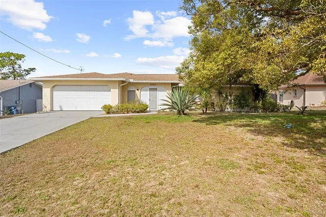 a front view of house with yard
