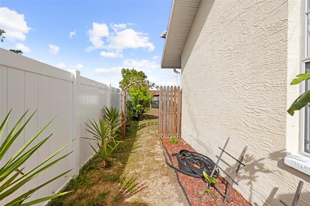4307 Goldcoast Avenue Spring Hill, FL 34609 - Photo 10 of 53 a view of a backyard of the house