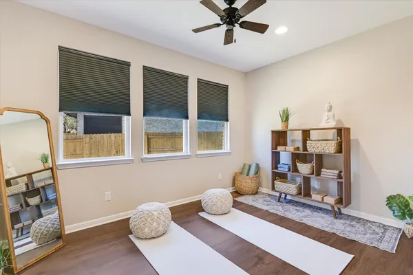 a living room with furniture and a window