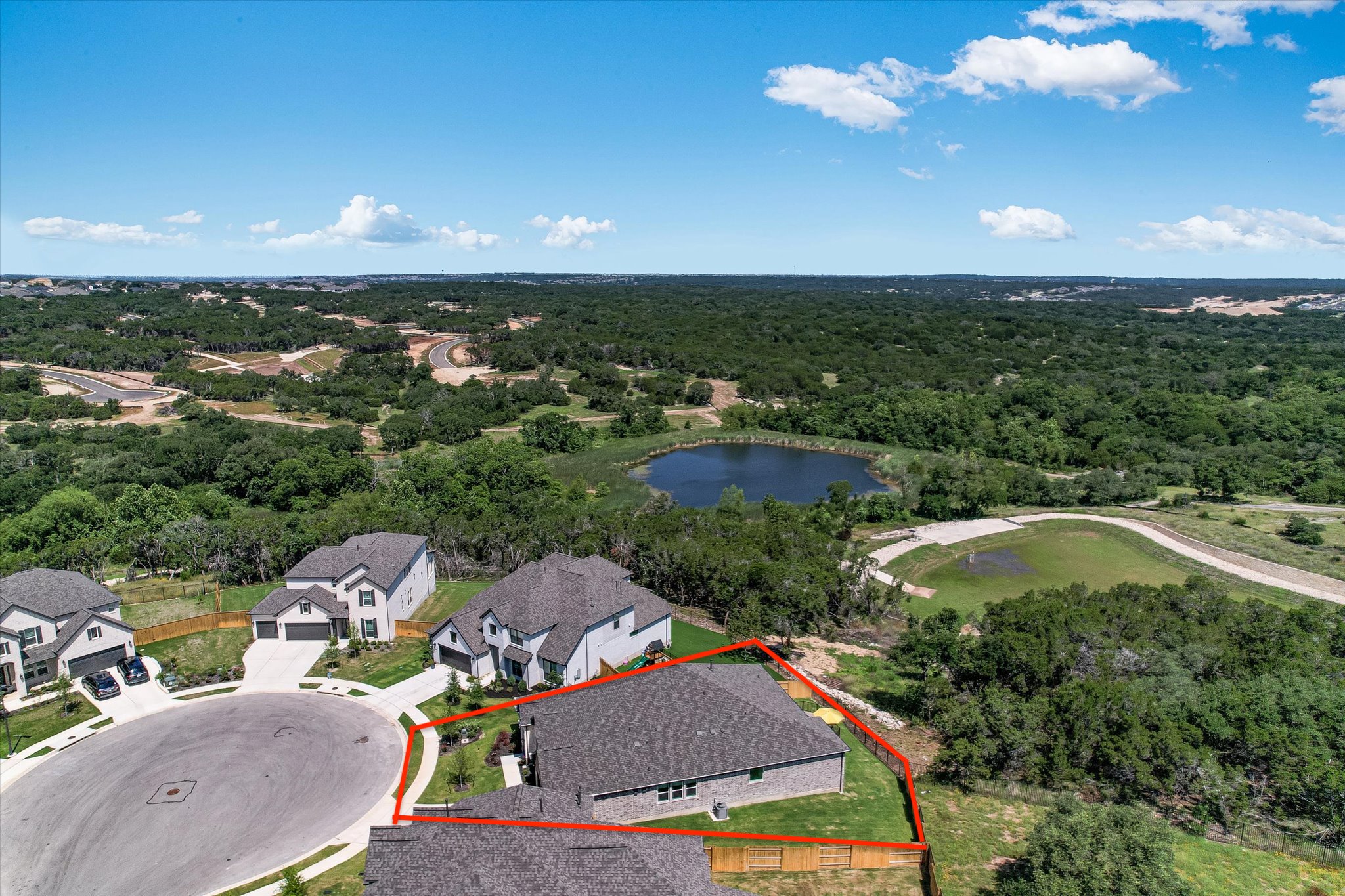 108 Trans Pecos Court Georgetown, TX 78628 - Photo 2 of 32 an aerial view of a house with a garden