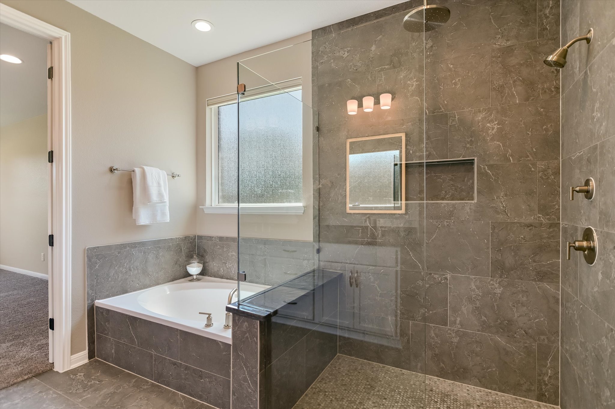 108 Trans Pecos Court Georgetown, TX 78628 - Photo 9 of 32 a bathroom with a sink and a mirror