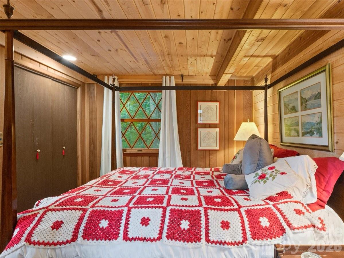 119 Foxden Road Mars Hill, NC 28754 - Photo 30 of 38 a bedroom with a bed and a large window