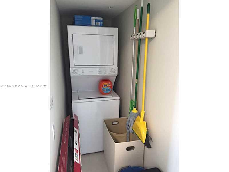 92 Southwest 3rd Street, Unit 2911 Miami, FL 33130 - Photo 11 of 16 a utility room with dryer and washer