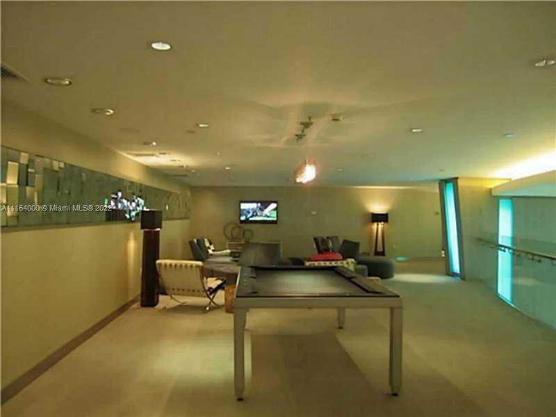 92 Southwest 3rd Street, Unit 2911 Miami, FL 33130 - Photo 14 of 16 a view of a room with gym equipment