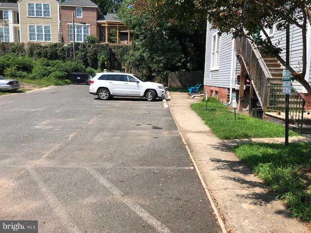 1122 Caroline Street, Unit 4 Fredericksburg, VA 22401 - Photo 14 of 15 a view of multiple houses with yard