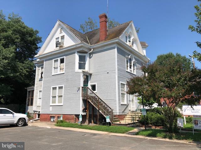 1122 Caroline Street, Unit 4 Fredericksburg, VA 22401 - Photo 15 of 15 a front view of a house with a yard