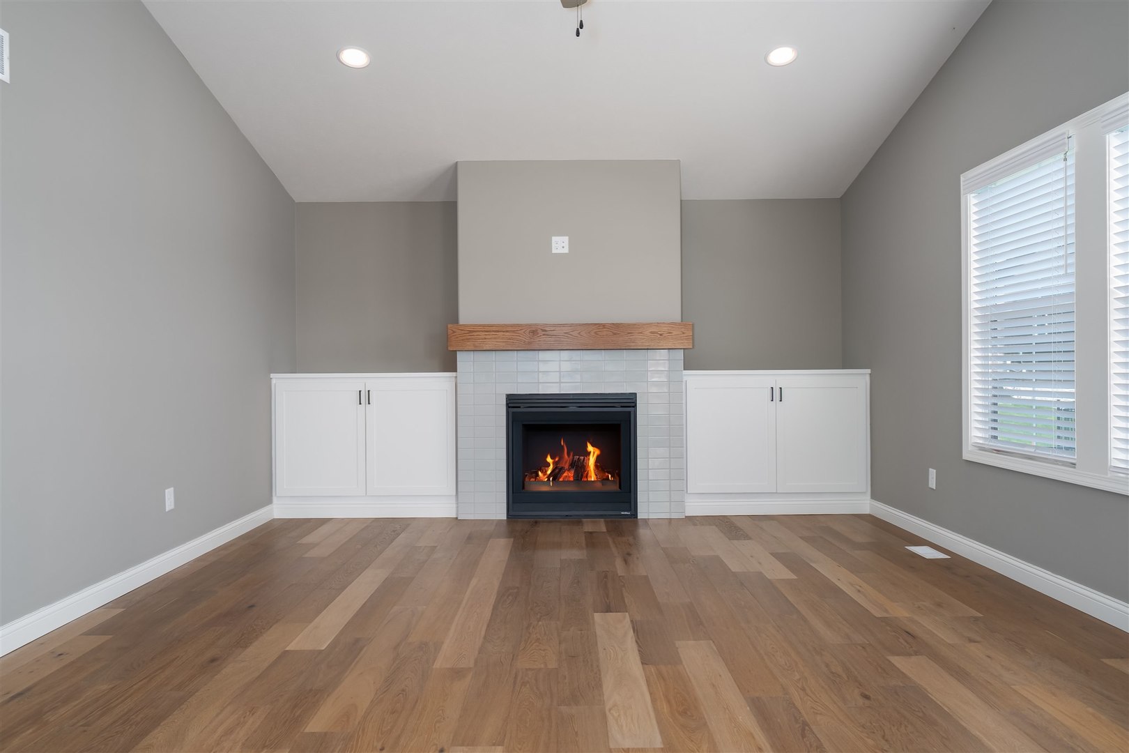 1172 Hershey Road Normal, IL 61761 - Photo 13 of 37 a view of an empty room with a window and fire place