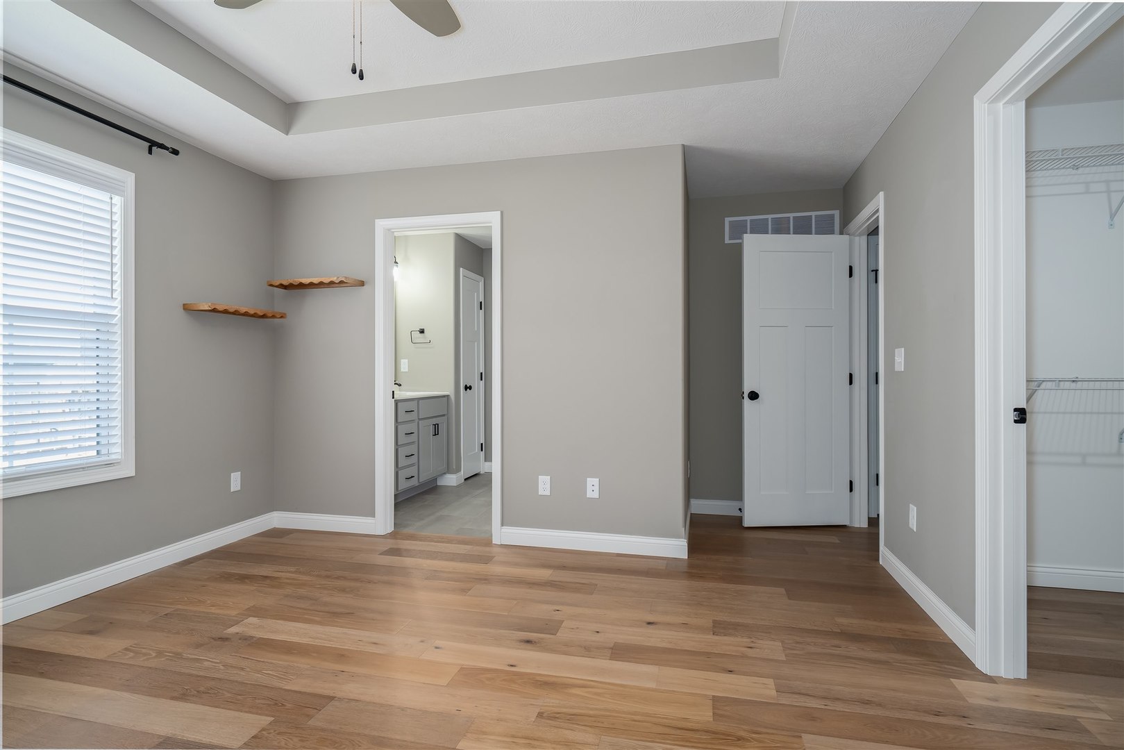 1172 Hershey Road Normal, IL 61761 - Photo 16 of 37 a view of empty room with wooden floor and window