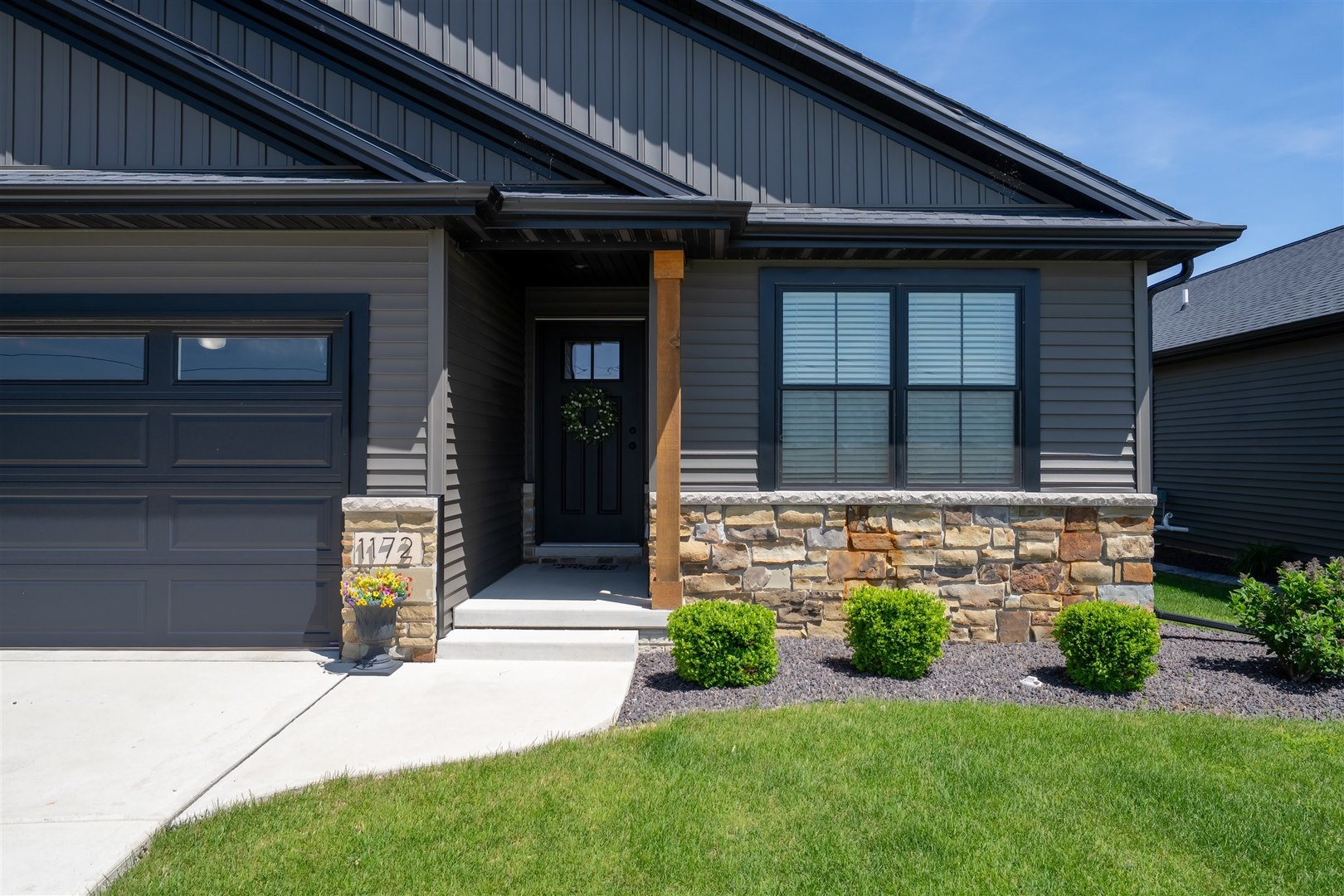 1172 Hershey Road Normal, IL 61761 - Photo 2 of 37 a front view of a house with garden