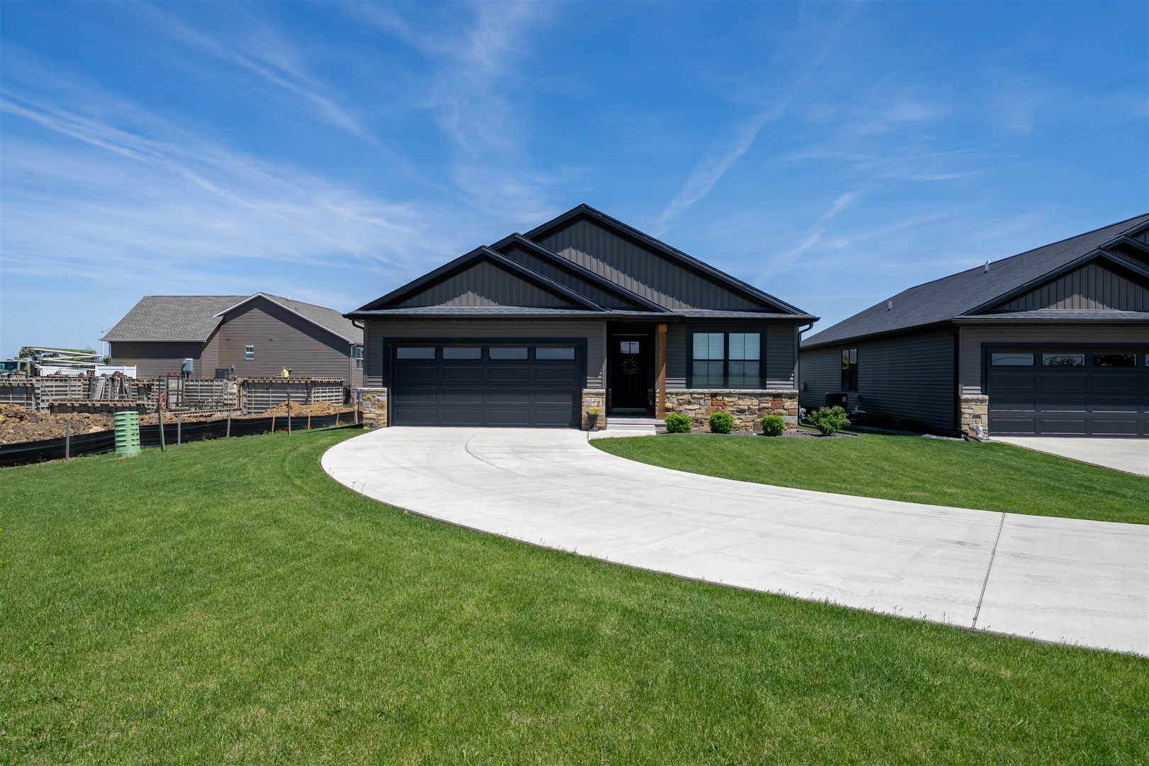 1172 Hershey Road Normal, IL 61761 - Photo 27 of 37 a front view of a house with a garden