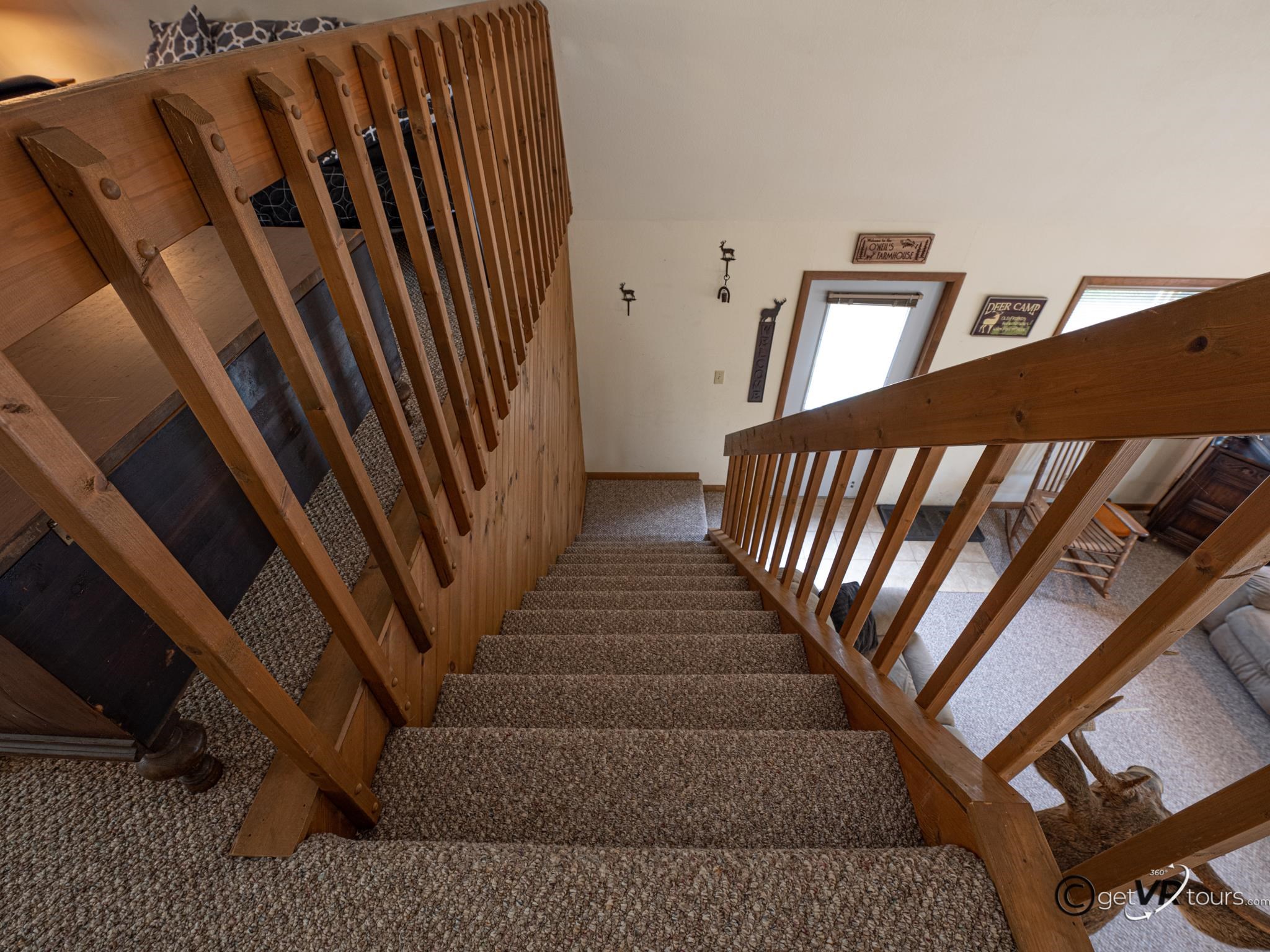 4561 East Welch Road Elizabeth, IL 61028 - Photo 15 of 60 a view of a staircase