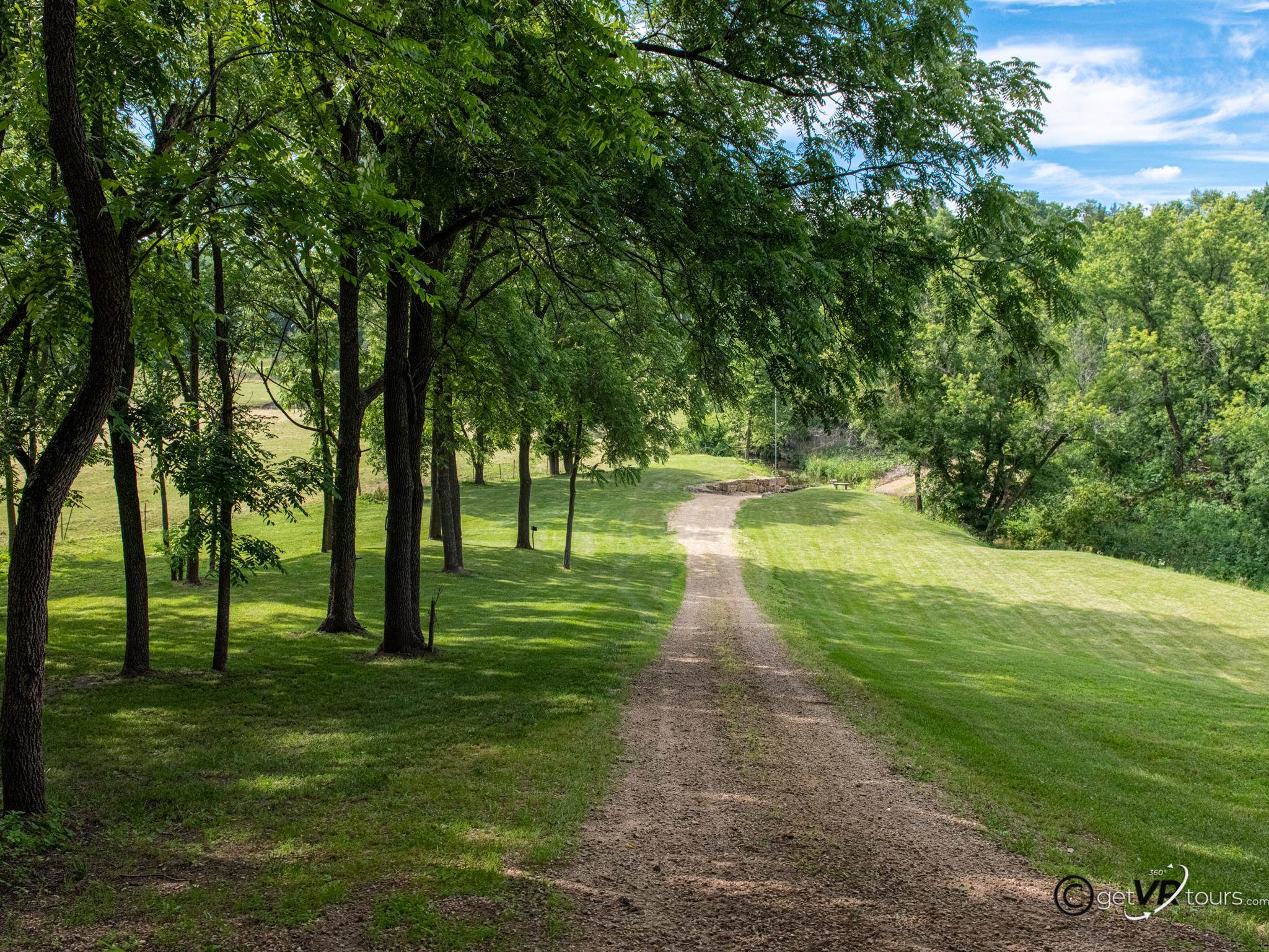 4561 East Welch Road Elizabeth, IL 61028 - Photo 23 of 60 a huge green field with lots of trees