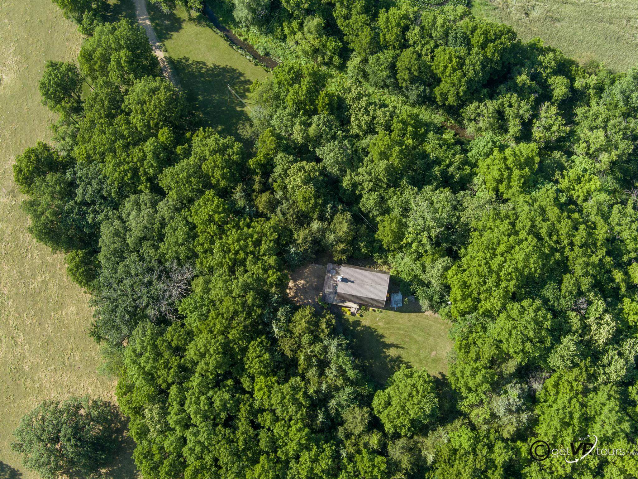 4561 East Welch Road Elizabeth, IL 61028 - Photo 35 of 60 a view of a tree in a garden
