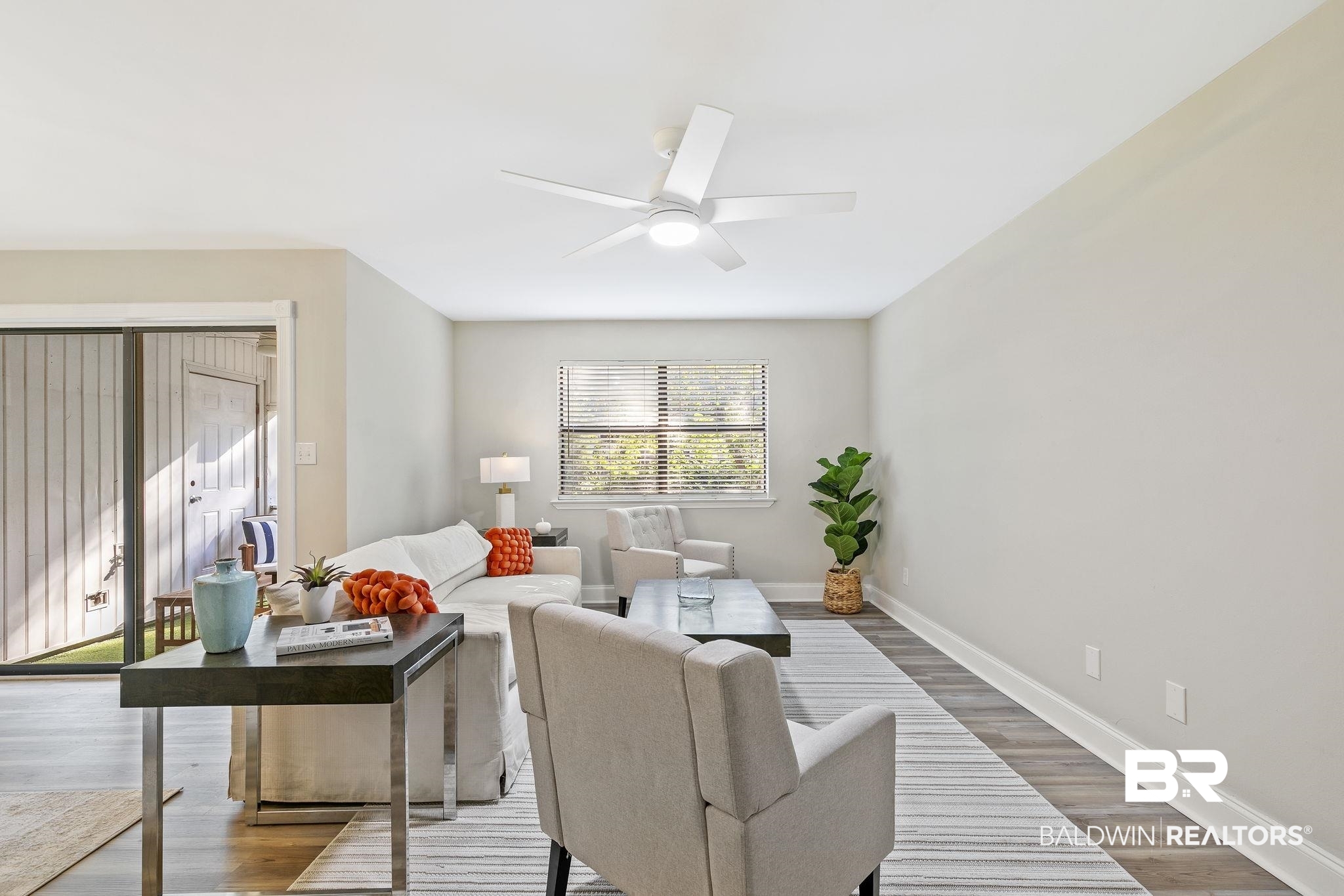 110 5th Street, Unit C103 Daphne, AL 36526 - Photo 7 of 46 Living room featuring light wood-type flooring and ceiling fan