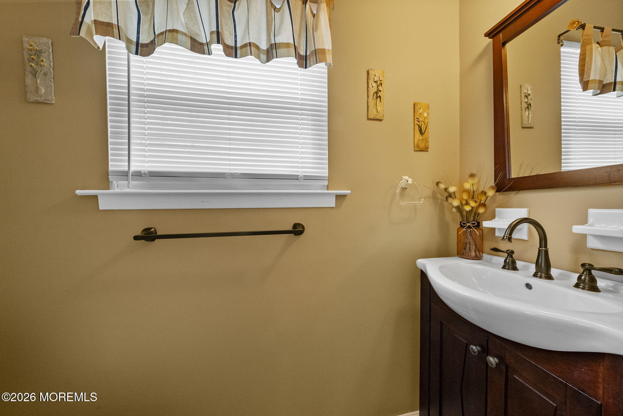 30 Arvin Road Old Bridge, NJ 08857 - Photo 15 of 31 a bathroom with a sink and a mirror
