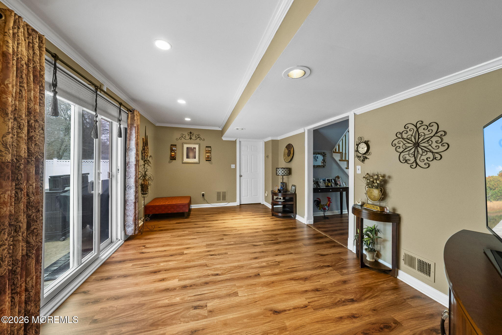 30 Arvin Road Old Bridge, NJ 08857 - Photo 17 of 31 a view of a hallway with wooden floor and furniture