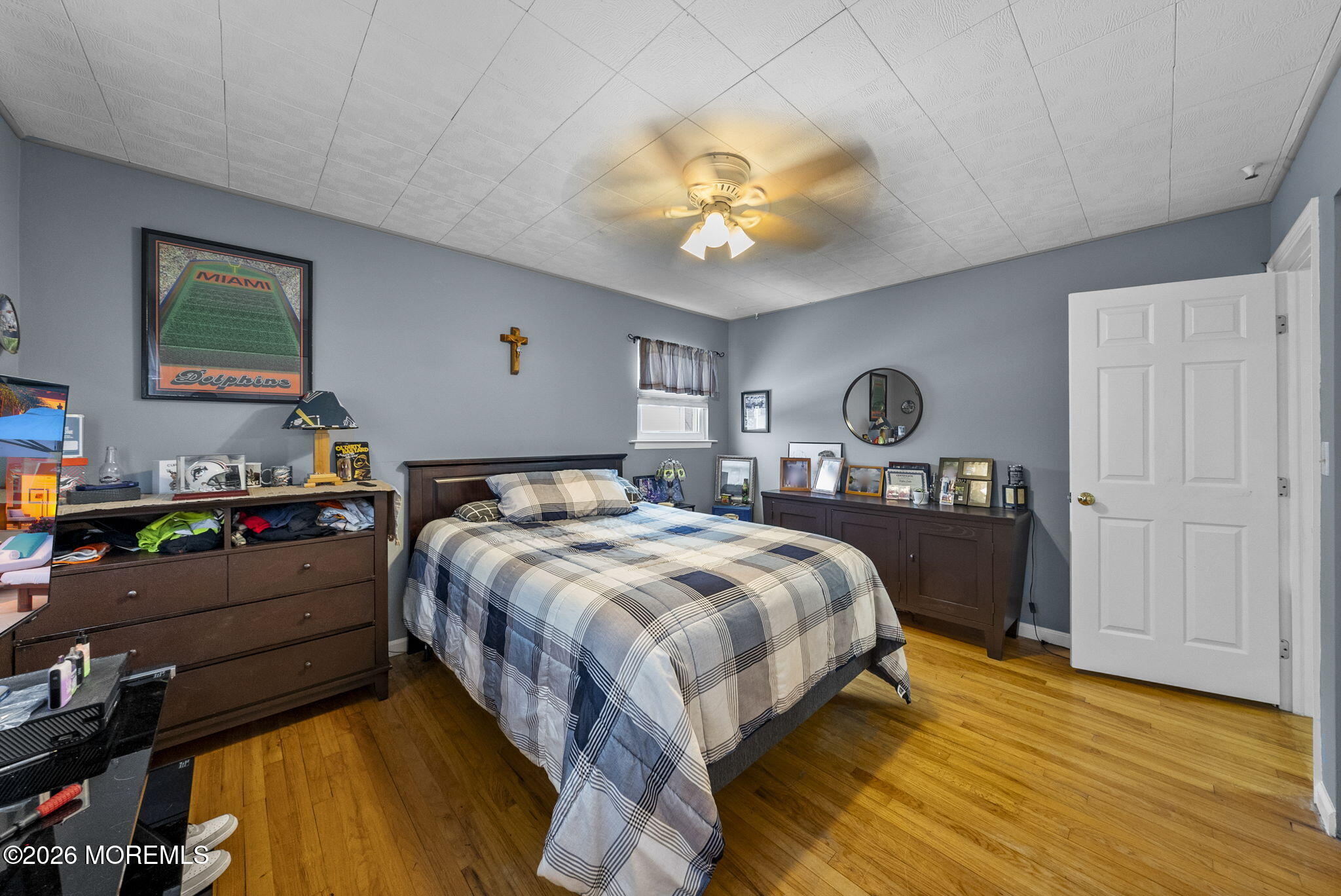 30 Arvin Road Old Bridge, NJ 08857 - Photo 24 of 31 a bedroom with a bed and a chandelier