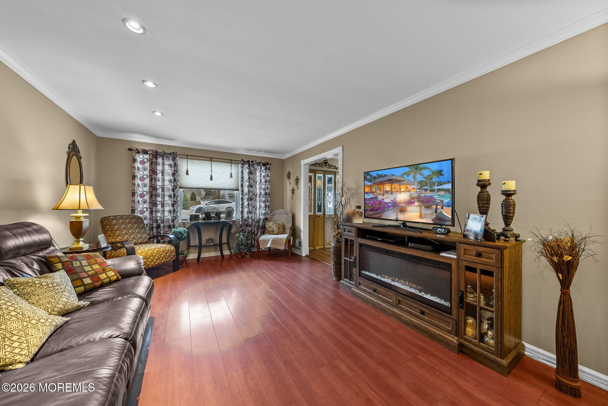 30 Arvin Road Old Bridge, NJ 08857 - Photo 6 of 31 a living room with furniture and a flat screen tv