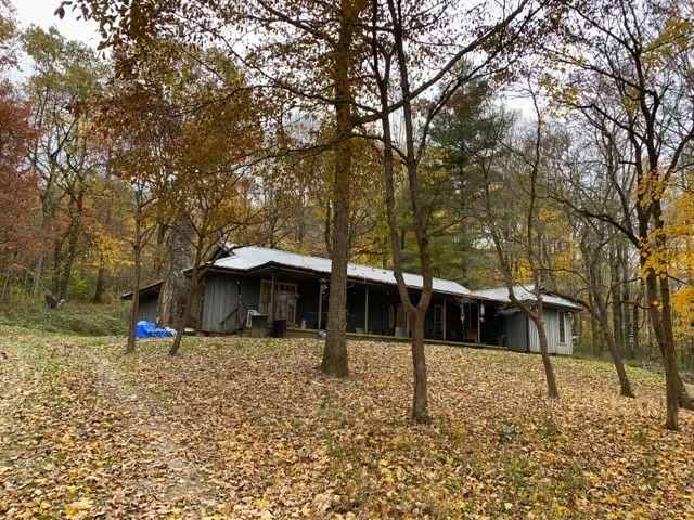 7080 Bolestown Road Alpine, TN 38543 - Photo 2 of 12 a front view of a house with a yard
