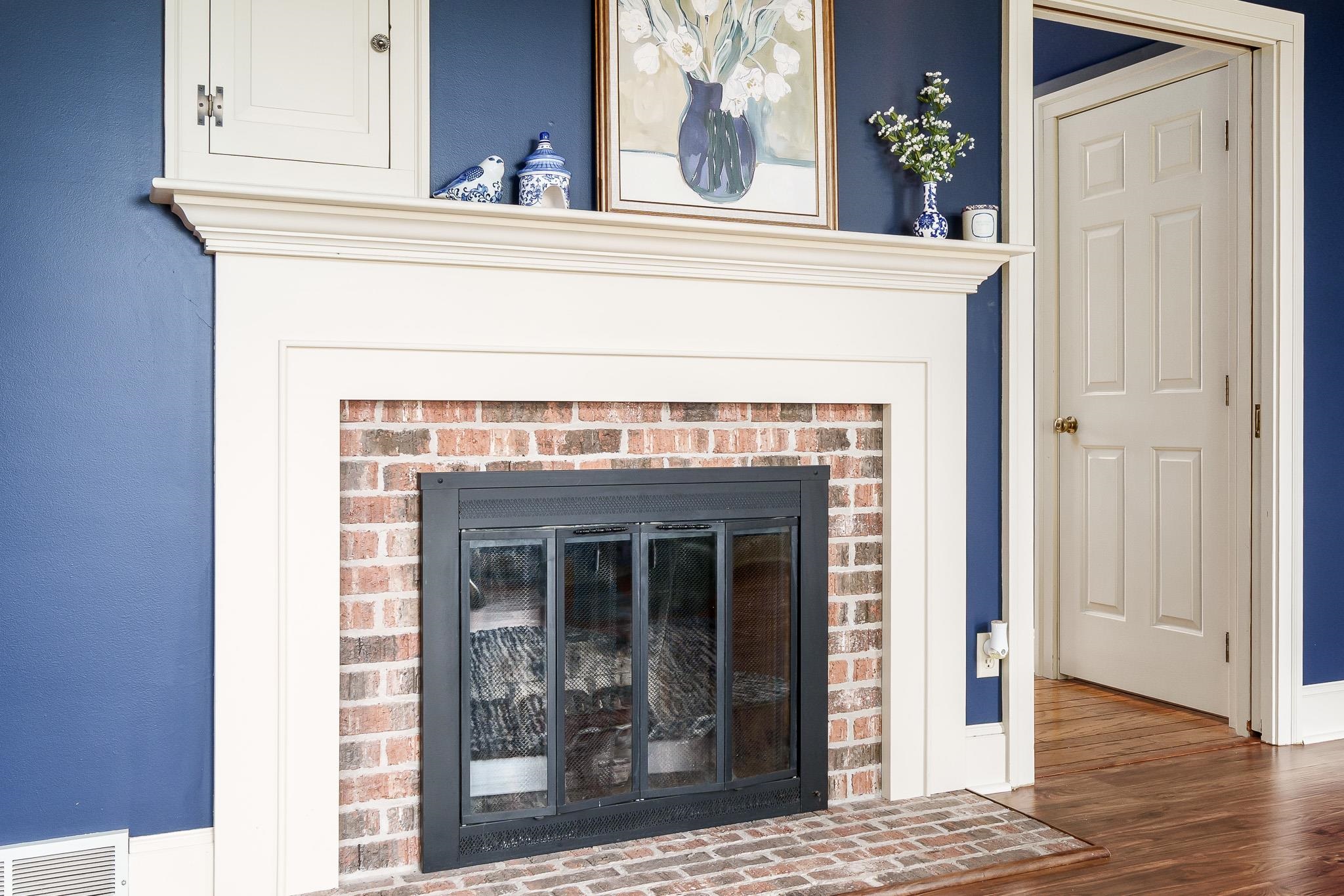 10562 Town Hall Road Belvidere, IL 61008 - Photo 18 of 72 a view of a living room that has a fireplace