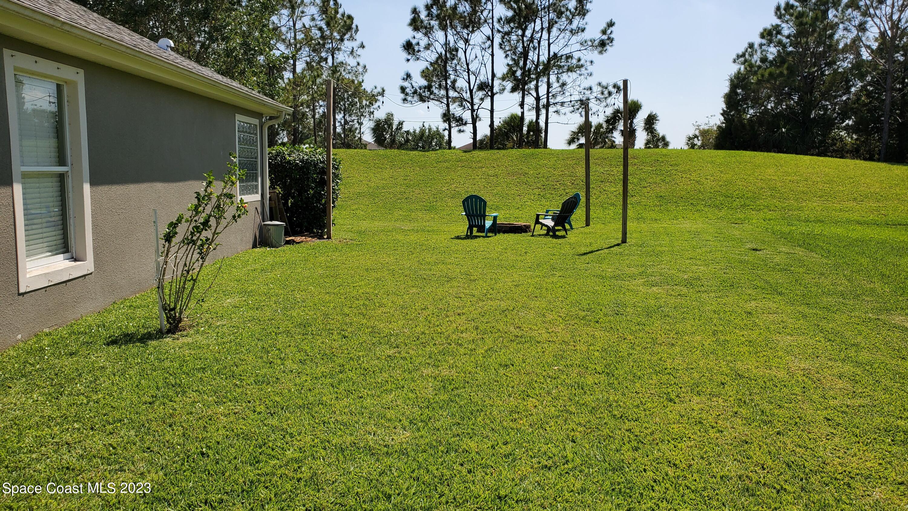 3625 Fodder Drive Rockledge, FL 32955 - Photo 39 of 47 a view of a golf ground with large trees
