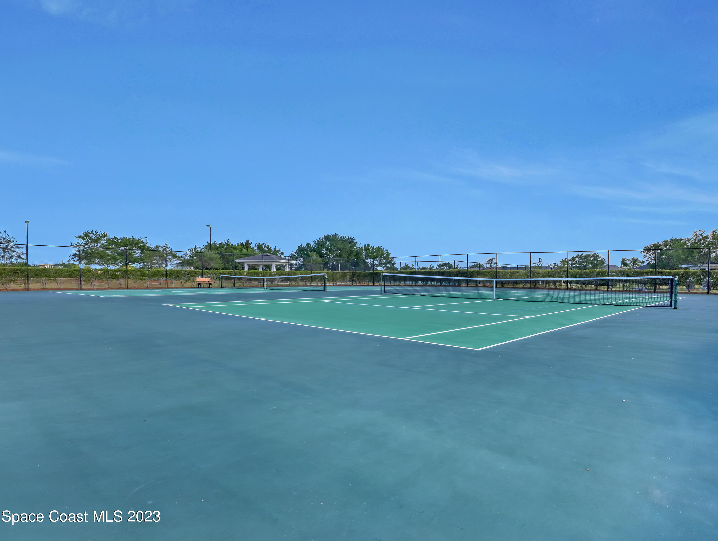 3625 Fodder Drive Rockledge, FL 32955 - Photo 46 of 47 a view of a golf course with a lake
