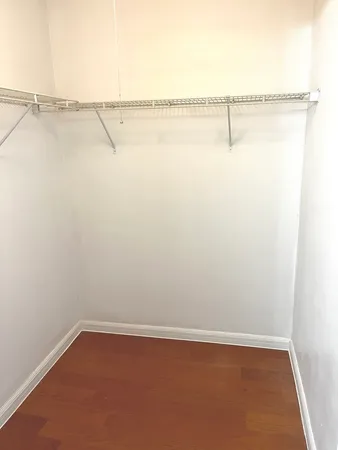 a view of a room with racks on the wall