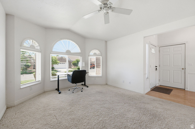 805 South River Road, Unit 70 St. George, UT 84790 - Photo 22 of 38 Bay window area featuring three arched windows with horizontal blinds, providing abundant natural light